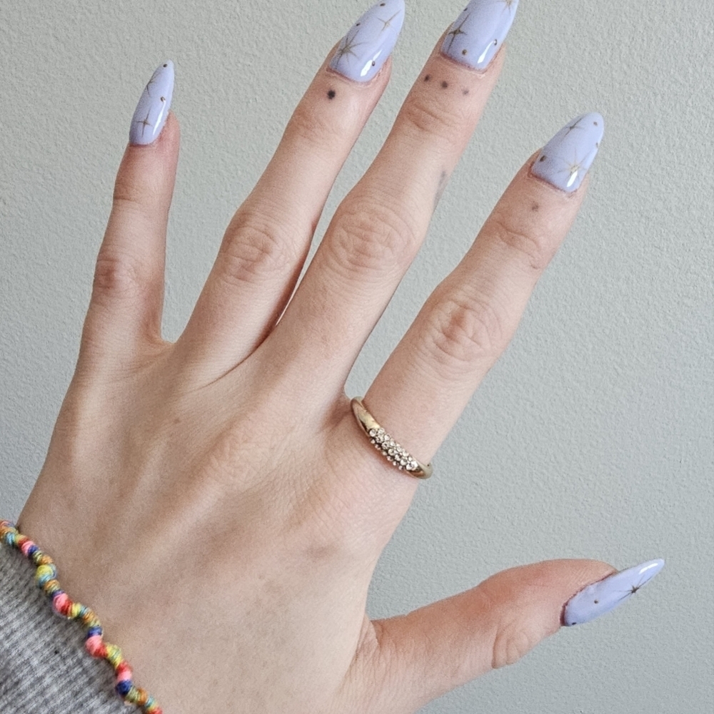 Gold colored ring with rhinestones size 7/8